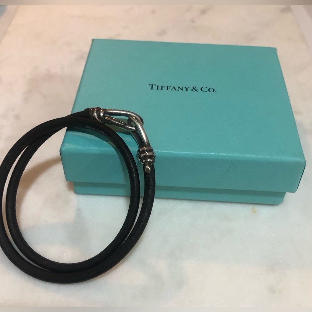 Tiffany and Co. Men’s leather and silver bracelet with box.